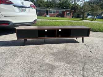 brand new low profile 70 inch wide TV stand 16 inches tall