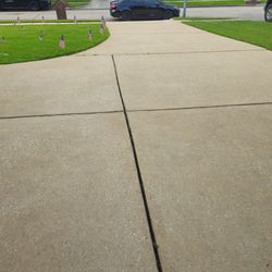 Pressure Wash Driveway $100