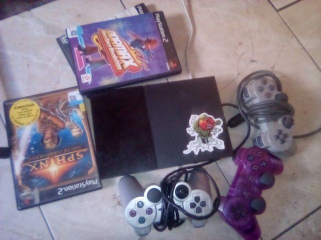 PS2 Slim With Games And 3 Controllers