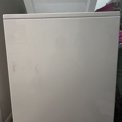 GE Stacked Laundry Center with 3.8-cu ft Top load Washer and Electric 5.9-cu ft Dryer