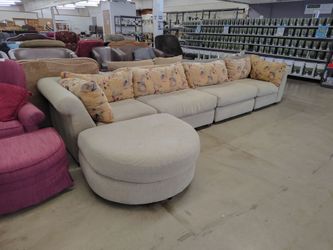 Beige 4 piece sectional w/ ottoman