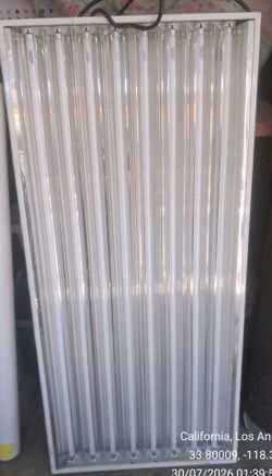 8 bulb flourescent grow light with reflective tape