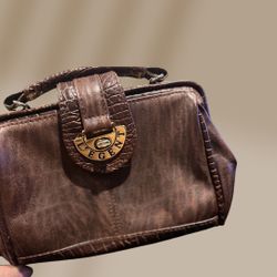 L’egent brown leather clutch