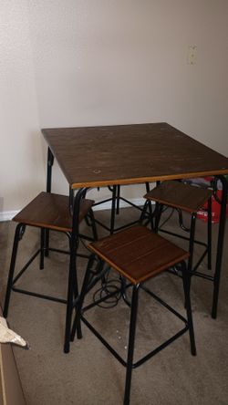 Small counter high table with stools