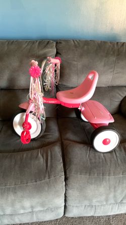 RADIO FLYER TODDLER PINK BIKE ALSO HAS COMPARTMENT IN BACK