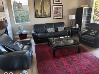 One couch two chairs three tables