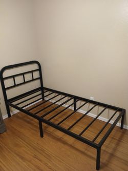 Black metal twin size bed frame