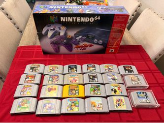 Nintendo 64 cib atomic purple and lot of games