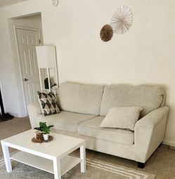 Beige sofa living spaces 89’ length with active protection plan of two years