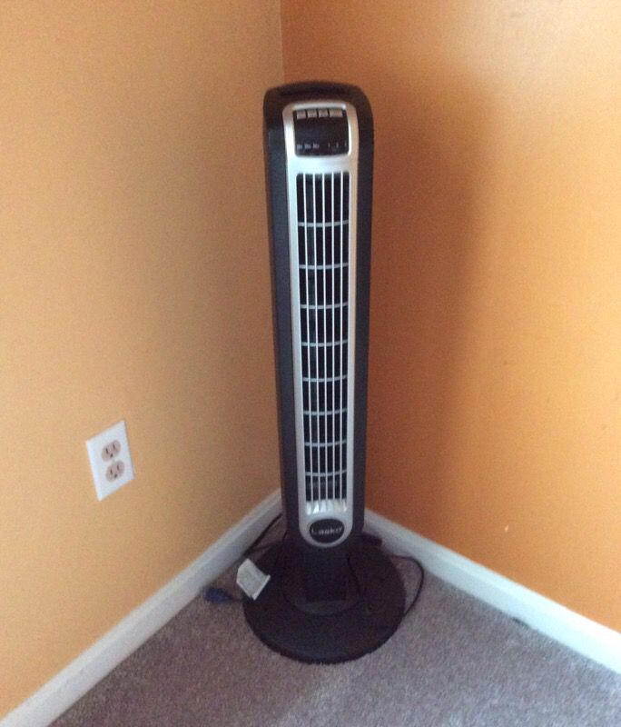 Lasko fan with remote control and timer. Almost brand new. Cash only