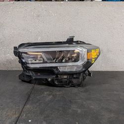 2021-2022-2023 TOYOTA TACOMA LEFT HEADLIGHT OEM USED #9542