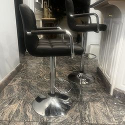 Adjustable black and silver bar stools