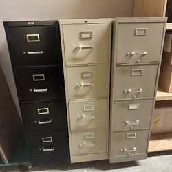 FREE - 4 Drawer Upright File Cabinets.  