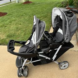 G raco DuoGlider Double Stroller | Lightweight Double Stroller with Tandem Seating, Glacier