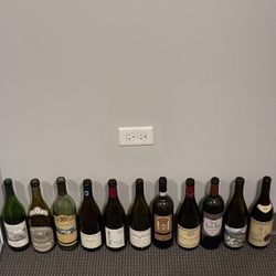 11 empty wone bottles