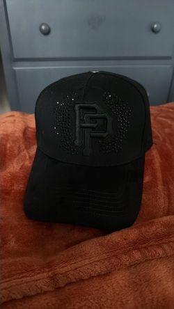 Tito doble p rosones hat
