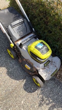 Ryobi mower. Needs repair but forward propel works