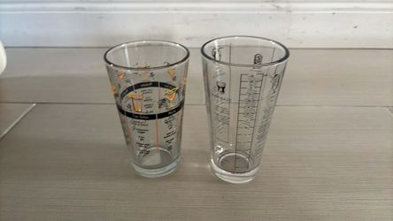Two glasses with recipes to prepare drinks both $10