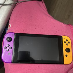 Nintento Switch (with 3 Games And A Case )