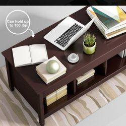 Coffee Table With A Hidden Compartment And Storage Shelves