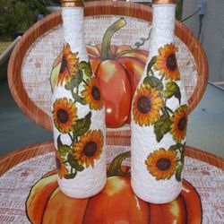 Beautiful bottles decorated by hand. Perfect for fall..
