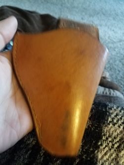 Holster hand tooled , leather