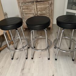 Set of 3 Torin Big Red Swivel Bar Stools – 29” Height, Black Chrome