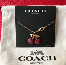 COACH NEW YORK GOLD TONE PAVE CHERRY PENDANT NECKLACE 16”*2” NWT POUCH PAPERWORK