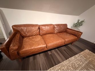 100%  leather brown couch