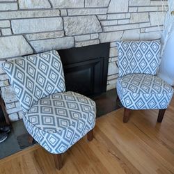 Two living room sitting chairs, fabric upholstery