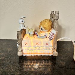 Vintage Precious Moments figurine illuminated