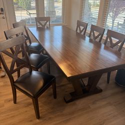 Dining room table and chairs.