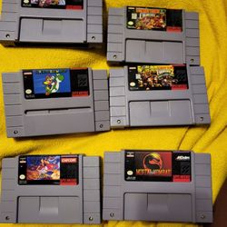 6 Super Nintendo Games Super Mario,mario Kart, Donkey Kong 1 And 2, Mortal Kombat AladdinAll games have been cleaned tested and working perfectly in e