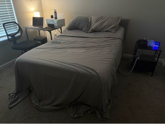Adjustable full size bed with remote.