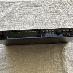 The item in the image is a Lexicon MPX 1 Multiple Processor FX rack unit, a classic digital signal processor