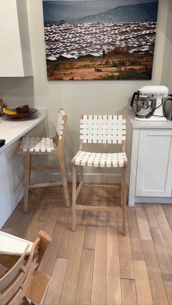 White leather bar stools pair