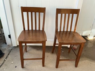 Two wooden high chairs (24” from the floor to the seat) the seats are 18” wide (both for $30)