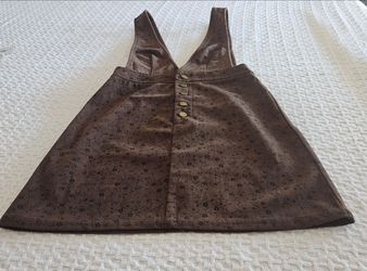 A-line skirt with suspender straps. Size 4