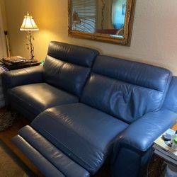 Blue Leather Duel Power Recliner Couch. Like New Condition 