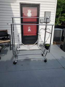 FOLDING DOUBLE CLOTHES RACK ON WHEELS