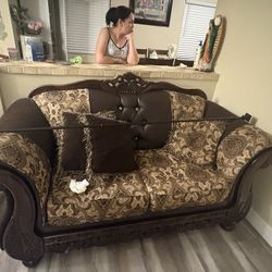 2 brown couches 