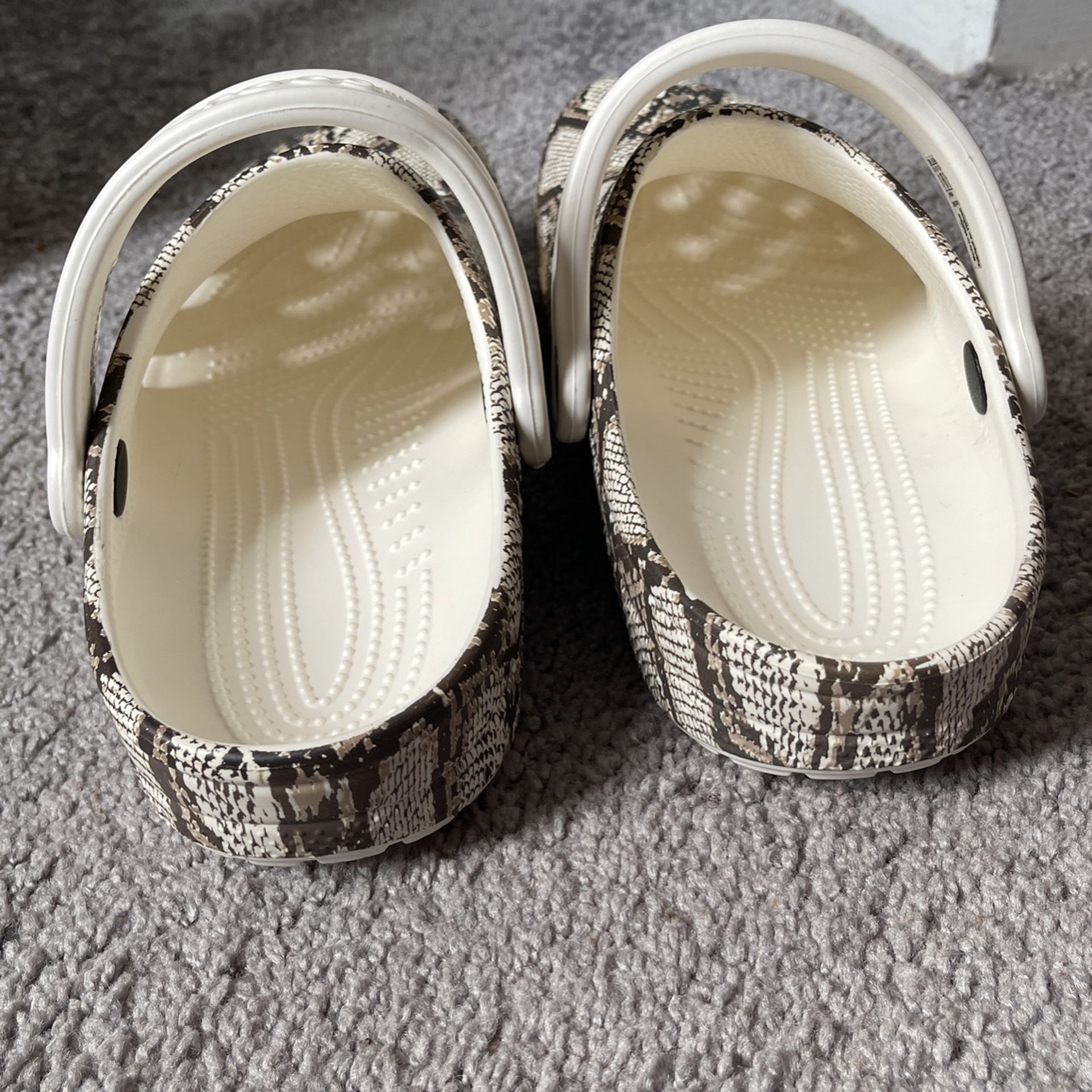 snakeskin platform crocs