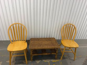 Two wooden chair in a table $50.Pick up only Elizabeth Nj