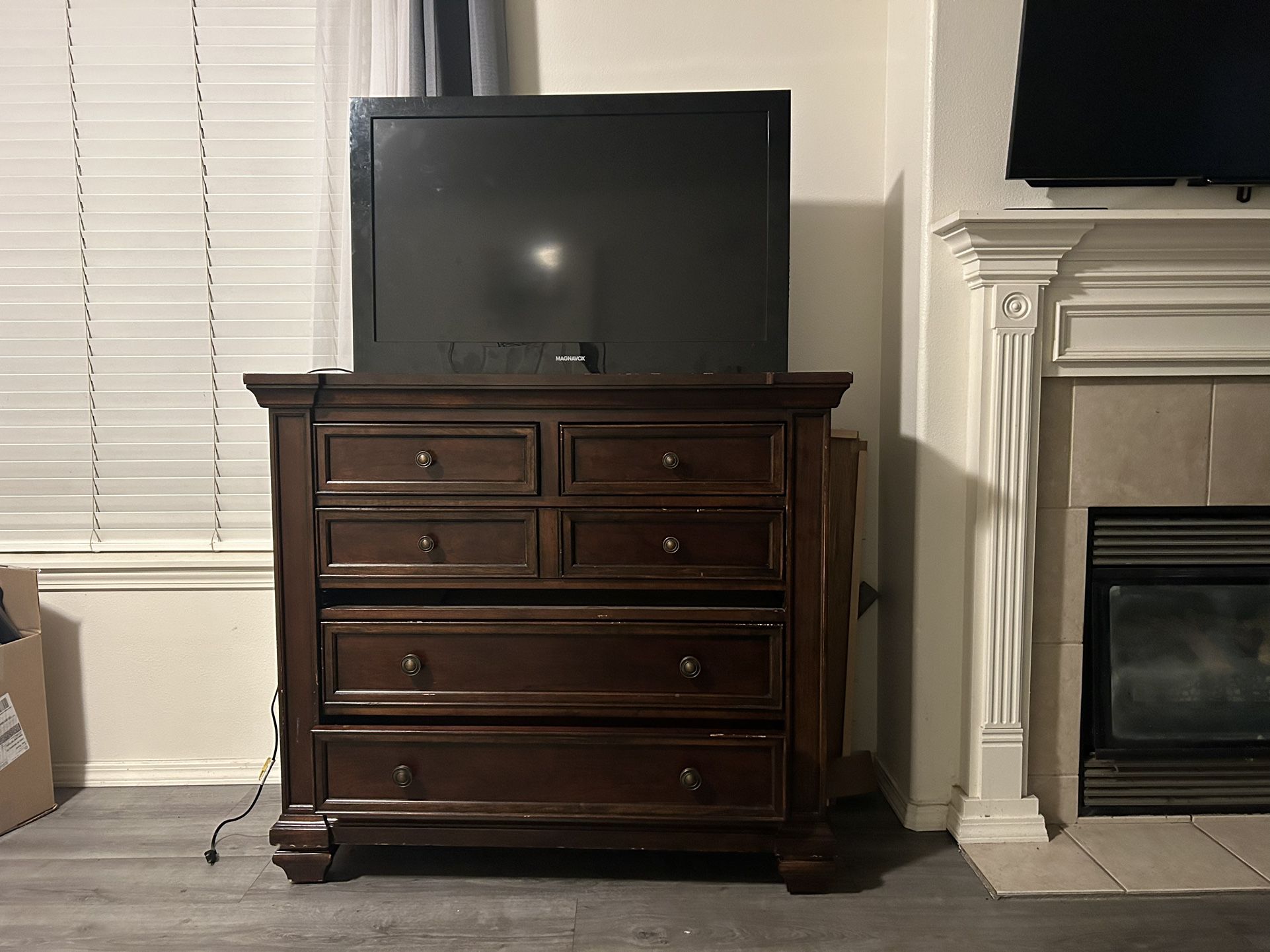 Tv Stand And Dresser 5 Drawer all the furniture is made of wood