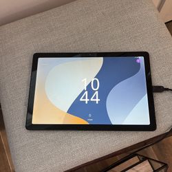 Small Tablet Computer -9 and 1/2 Inches by 6 and 1/2 Inches