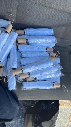 24 white umbrellas
