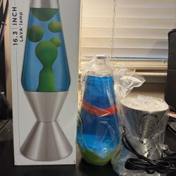 Lava Lamp 16.3 Silver Base New  50. Asking 25. 