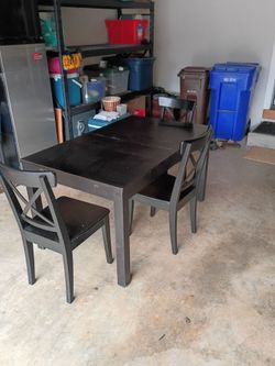 Table and three chairs comes with two leafs