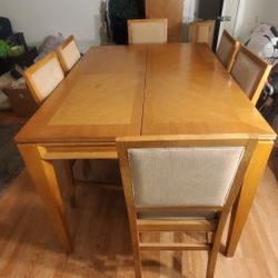 Wooden Dining Table With Table Extension and 8 Chairs, all in great condition!! $100 obo