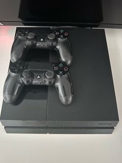 PS4 with games and 2 controllers